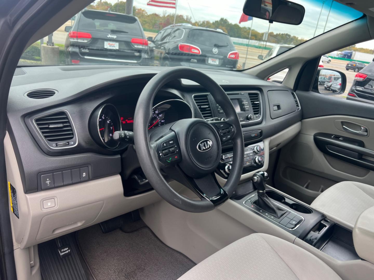 2016 GRAY Kia Sedona LX (KNDMB5C18G6) with an 3.3L V6 DOHC 24V engine, 6-Speed Automatic transmission, located at 420 I-35E, Lancaster, TX, 75146, (469) 297-4144, 32.593929, -96.823685 - Photo#1